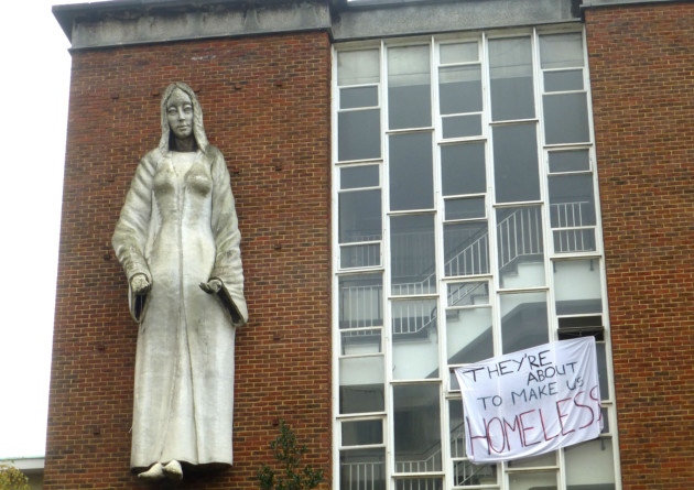 The convent building adorned with a banner erected by the squatters. Picture: Nigel Sutton.